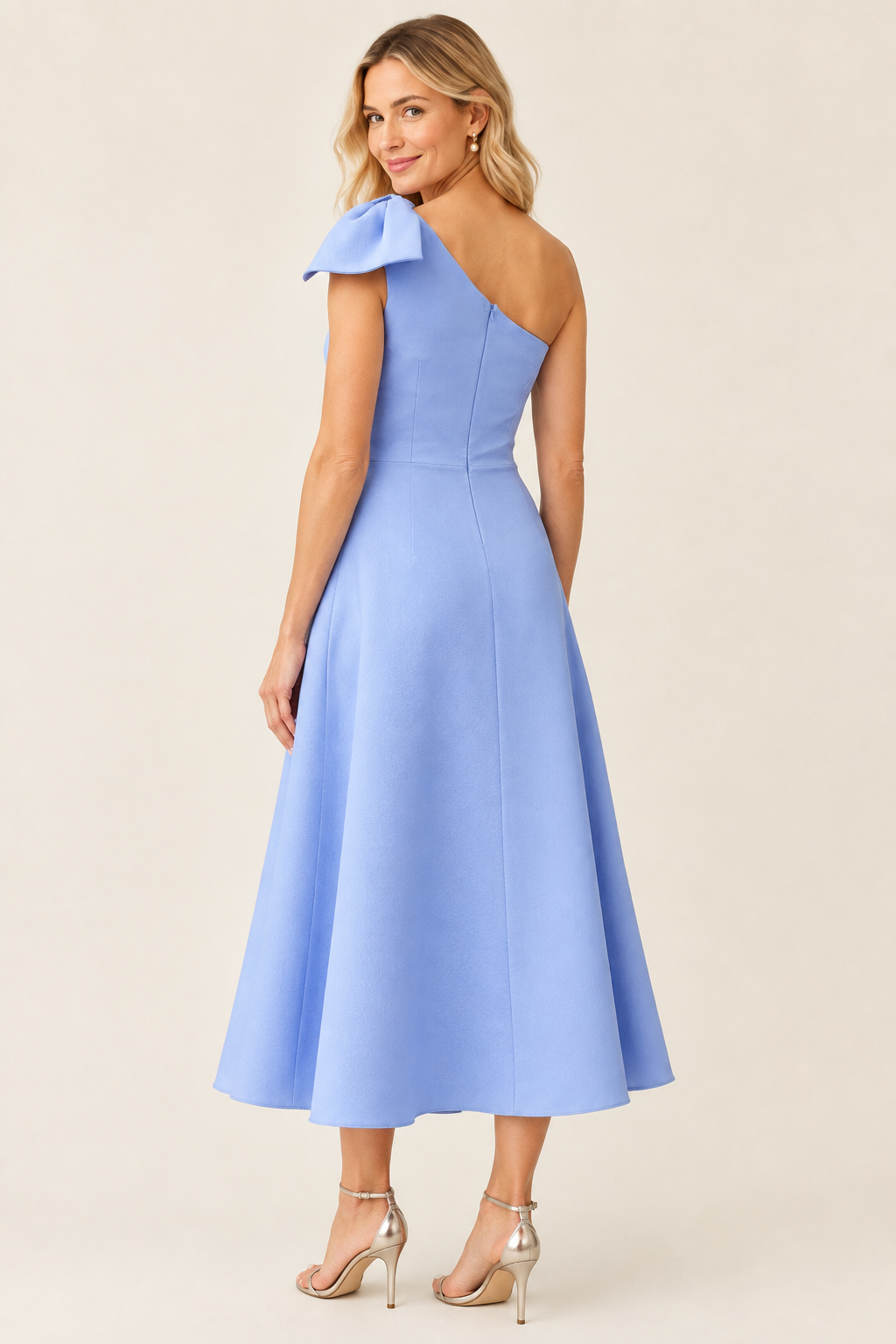 Blue bow dress, rear three-quarter view
